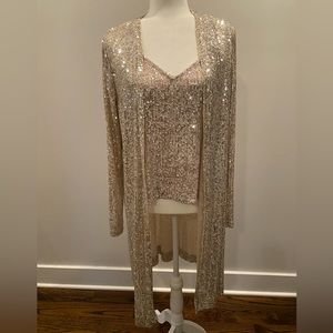 Size Large Champagne colored sequin duster with matching cami. Slits on sides
